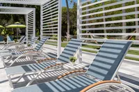 loungers in a cabana by interior designer
