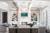 designer living room charlotte. Living room design with ceiling moulding. All white living room design. Gracious Home Interiors. Residential interior designer.