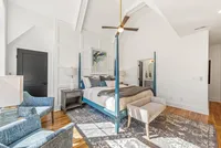 oversized window feature wall in primary bedroom