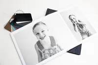 Black and white fine art album spread featuring playful child portraits, Kaitlyn Dawn Photography, Yucaipa family photographer.