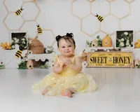 From frosting-covered fingers to the happiest birthday twirls, this bee-themed session was buzzing with joy. Captured by Yucaipa cake smash photographer Kaitlyn Dawn Photography.