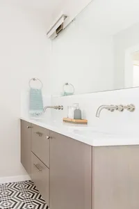 Fresh, modern bathroom remodel with floating vanity and hex tile floor - designed by Patina Living co.