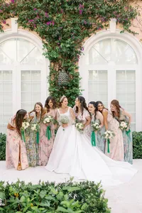 This beautiful Colony Hotel Wedding in Palm Beach showcasing mix and match different pastel color floral bridesmaids dresses captured by Sunny Lee Photo