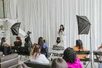 Elaine Tsung conducting a branding coaching session, guiding clients through personal brand strategy and design insights.