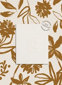 Logo en relief sur papier de l'entreprise Elisa Demanet, coach bien-être.