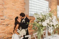 couple kissing at Outreach Event Space