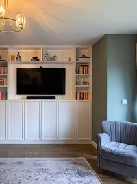 ikea-billy-built-in-grey-armchair-card-room-green-walls