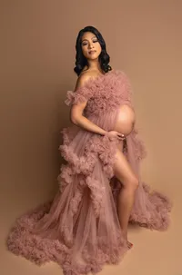 mother-to-be in boho style gown during outdoor maternity photography near Los Angeles
