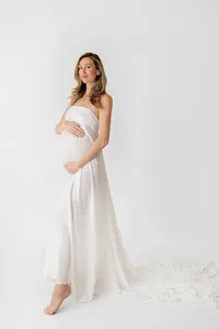 pregnant woman Rosalyn in white dress during fine art maternity session
