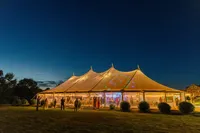 Sailcloth tent glowing at dusk