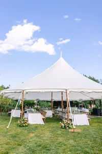Sailcloth tent on the lawn on a sunny day