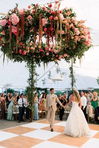 Patty and Cooper's first dance beneath a floral chandelier at the Samoset Resort