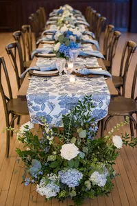 Long table lined with blue and white florals