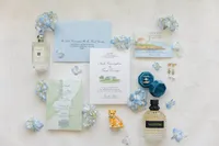 Blue and white invitation suite with wedding details