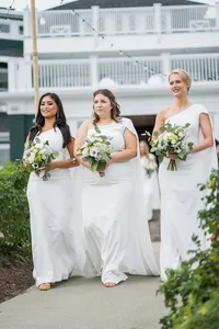 Flower girls walking down the aisle