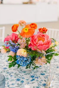 Peonies and garden roses in a bright centerpiece