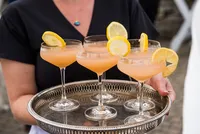 Glassware arranged on a silver tray for the cocktail hour at French's Point