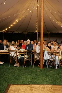 Tent glowing with string lights at night