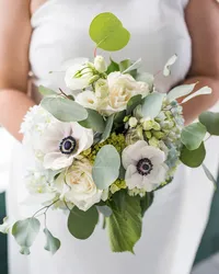 White bouquet with anemones and greenery