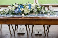Head table with lush white and blue florals