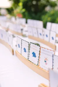 Close up of escort cards with blue accents