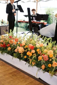Bright floral garland along the head table