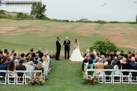Guests gathered on the lawn for a ceremony at Chebeague Island Inn