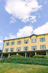Chebeague Island Inn under a bright summer sky