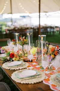 Candlelit tablescape with colorful florals