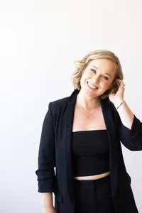 Lis in a black suit