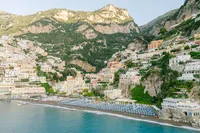 Scenic panorama of Positano village cascading down the cliffs to the beach — a dream destination for weddings in Italy.