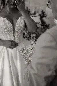 a black and white shot of a letter written to a father of the bride at chandelier farms