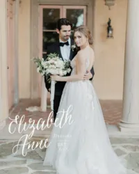 Kohnur fine art bride in a dreamy floral gown with natural, glowing makeup and soft, pinned updo embracing her groom in a romantic Italian-inspired villa featured on Elizabeth Anne Designs.