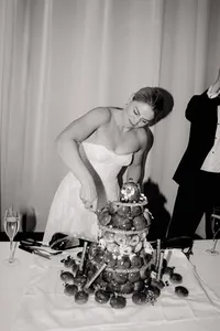cake cutting photo with a bride