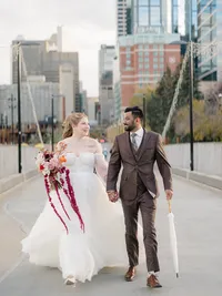Downtown Calgary Wedding Photos with skyline views -Calgary wedding photographers-Timeless Tales Creatives
