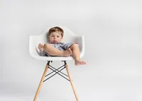silva-slouching-in-chair-chicago-portrait-studio