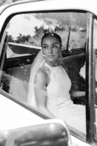 Bride looking out the car window