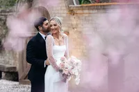 Groom holding his bride and kissing her in their Hunter Valley wedding photos
