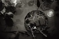 BW Cake piece with two forks at bridal table