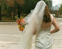 Bride walking in the North Shore with Bridal Bouquet