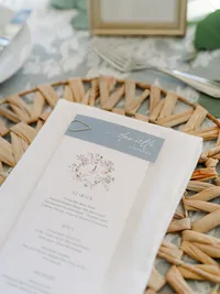 Detail photo of wedding menu card on placemat