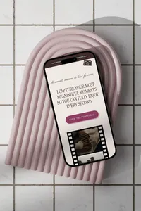 Wedding photography website displayed on an iPhone.