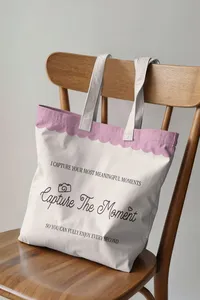 Tote bag featuring the Capture the Moment logo.