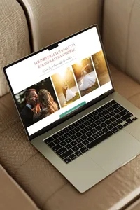Wedding photography website displayed on a laptop.