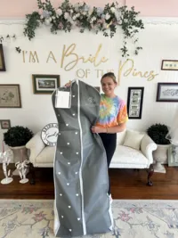 bride taking home wedding dress from bride of the pines in aberdeen north carolina