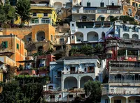 Stacked cliffside houses in Positano on the Amalfi Coast