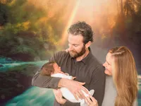 4Karma Studio - A luxury family portrait with a newborn in Los Angeles, featuring a custom-designed digital environment and fine art composite background with true-to-life lighting.