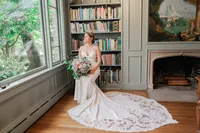 Los Angeles wedding photography bride portrait at a library venue with elegant fine art composition, true to life color, soft natural window light, and editorial bridal posing.