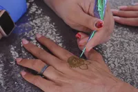 bride with henna tattoo