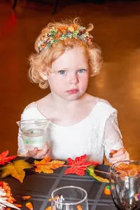 Portrait of a flower girl at a Halloween wedding in San Francisco